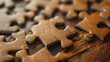 © QAISAR - Puzzle pieces on wooden desk