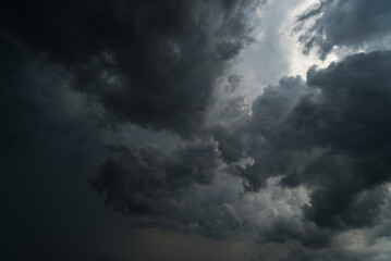 Wall Mural - dark sky with stormy clouds. dramatic sky rain,dark clouds before a thunder-storm.