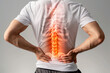 © amazing studio - Man pain office syndrome at his back with highlight at backbone and spine.