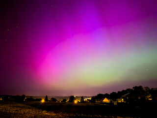 Wall Mural - aurora over the city in the night in germany