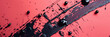 Black Ink Splatters on Vibrant Red Background