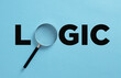 The word logic with magnifier. Logical analysis. Business and education concept.