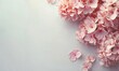 Pink hydrangea flowers on the right side of the picture, with a light background and copy space for text. A top view with soft light and a minimalist detailed flowers.