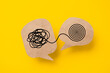© Ratana21 - Mental health, brain disorder concept. World mental health day, Alzheimer and Psychology concept. Tangle of thoughts and clear line on brown speech bubble with yellow background