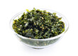 Kim Jaban dried seaweed sprinkles with sesame seeds in a bowl isolated on white background. With clipping path.