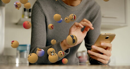 Sticker - Image of emoji icons flying from left to right with a mid section of a young Caucasian woman holding