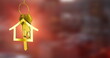 Image of golden house keys hanging against blurred background with copy space