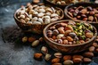 Different varieties of nuts In a wooden bowls over rustic background. Hazelnuts, almonds, pistachios.