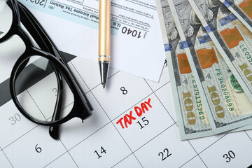 Wall Mural - Calendar with date reminder about tax day, documents, money, pen and glasses, top view