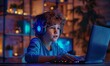 © Влада Яковенко - Young gamer wearing headset playing video games on laptop at desk