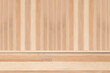 Empty wooden table over blurred wooden wall background. For product display