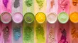 An array of powdered ingredients and colorful smoothie drinks displayed in rows with vibrant hues