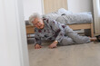 Elderly woman tripped and fell from bed, injured herself, broke her hip.