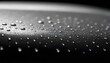 © Sema - Monochrome image of water droplets on a cars exterior surface