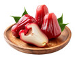 © irham - Rose Apple fruit on a wooden plate on a transparent background