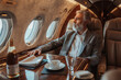Thoughtful mature businessman traveling by private jet