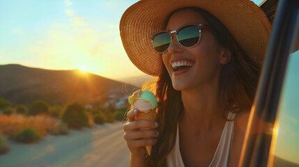 Wall Mural - Happy smiling young woman holding ice cream cone, sticking her head out of car window while traveling in the summer. Girl wearing sunglasses and straw hat,automobile transportation to vacation holiday