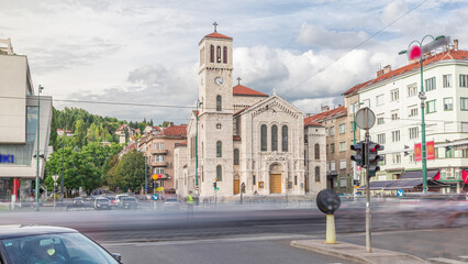 Poster - City traffic and people on the cross walk in front of Saint Joseph's Church on Titova street timelapse hyperlapse in Sarajevo, Bosnia