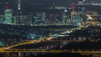 Wall Mural - Skyline of Vienna from Danube Viewpoint Leopoldsberg aerial night timelapse.