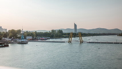 Wall Mural - View of Copa Cagrana timelapse, an area by the Neue Donau in the 22th district of Vienna