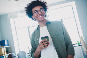 Canvas Print - Photo of handsome cool assistant dressed khaki shirt glasses enjoy coffee indoors workstation workplace