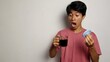 © ferrys - Young Asian man was surprised when he first tried the delicious taste of coffee