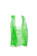 Close up Green plastic bag isolated on white background, cut out object, design element. Single-use polythene packet, Biodegradable packaging waste, Disposable bag for food, bag free day