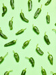 Green pepper over green mint background