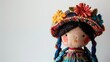 © AkuAku - A charming Mexican rag doll lovingly crafted by hand stands alone against a white backdrop