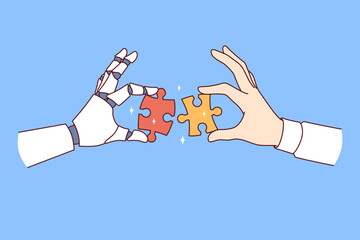 Wall Mural - collaboration between robot and human performing same task and holding different pieces of puzzle in
