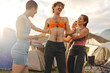 © Jacob Lund - Happy man wearing a bikini bra and having fun with his friend at festival camp