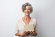 © Markus Schröder - Portrait of a glad woman in her 40s holding a box in white background