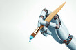 robotic hand holding paintbrush isolated on background