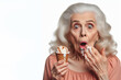 surprised old woman with Melted ice cream isolated on white background