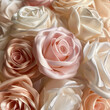 A bouquet of satin roses in shades of blush and cream, arranged to create an elegant floral arrangement for the bride's gown.