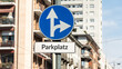 Signposts the direct way to Parking Place
