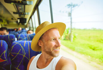 Great man riding in a traveler bus in costa Rica