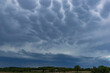 Dark mammatus clouds warn of an approaching thunderstorm. 