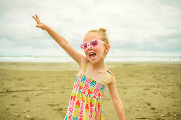 Wall Mural - Portrait of girl of 4 years on beach of Costa Rica