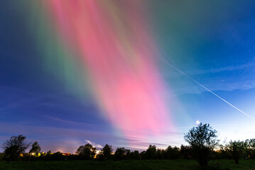 Wall Mural - Aurora borealis, The Northern lights at Kuldiga municipality, Latvia.