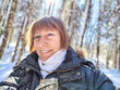 © keleny - Smiling Woman on a Sunny Spring or Winter Day Outdoors on nature