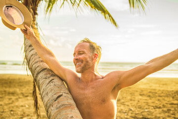 Wall Mural - nice man having great time on beach