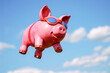 A pink pig with goggles soaring high in the sky