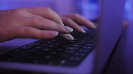 Person typing on laptop keyboard. working, writing emails, using internet, coding programming software, developing e-commerce project.