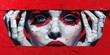 Portrait of Elegance: Womans Face on Crimson Canvas