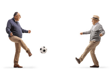 Wall Mural - Two mature men kicking football