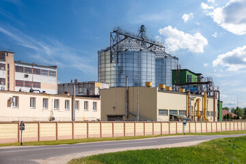 Wall Mural - silos granary elevator on agro-industrial complex with seed cleaning and drying line for grain storage