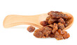 Frankincense resin in wooden spoon isolated on a white background. Pure organic frankincense resin.