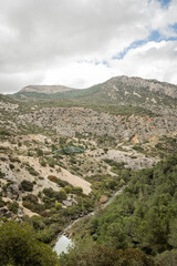 Wall Mural - hiking trail caminito del rey, kings walkway, in Malaga Spain. narrow footpath leads through natural beauty mountain range cliff faces of gaitanes gorge. hisotric landmark popular tourist attraction