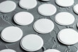 © Belho Med - blank round stickers mockup on textured surface for design presentation